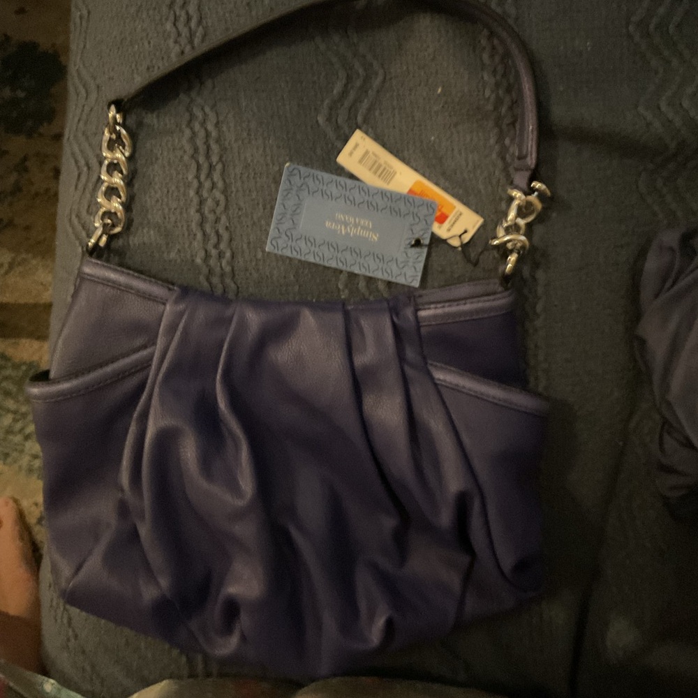 Simply Vera Wang, new with  tag measurements 10x 14.